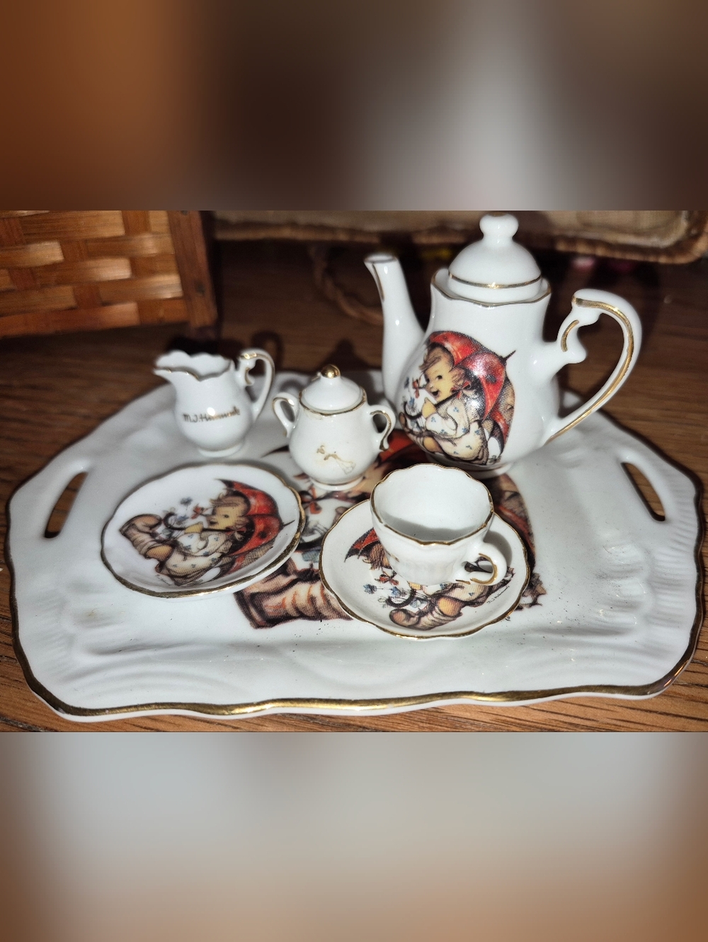 Vintage Reutter Porzellan miniature tea sets,  M.J. Hummel "Umbrella Girl"